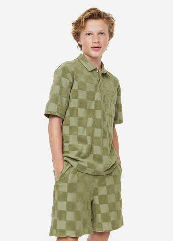 Оливковая детская футболка-поло для мальчика H&M однотонная