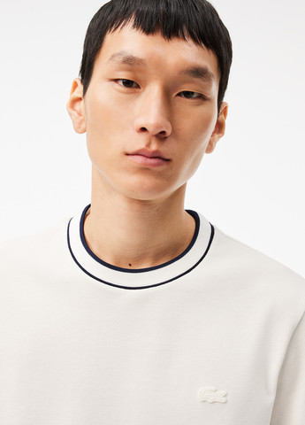 Белая футболка Lacoste