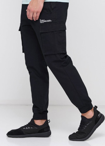 Черные спортивные демисезонные карго брюки Anta