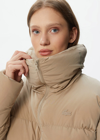 Бежевая зимняя куртка Lacoste