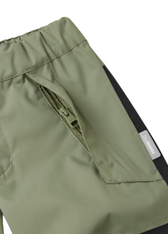 Зеленые демисезонные брюки Reima