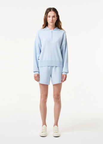 Голубой демисезонный свитер Lacoste