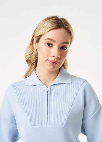 Голубой демисезонный свитер Lacoste