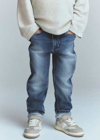 Синие демисезонные зауженные джинсы H&M