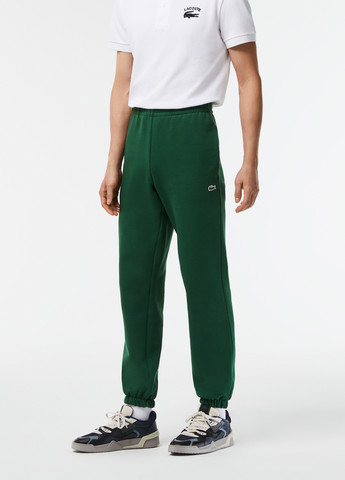 Зеленые спортивные демисезонные джоггеры брюки Lacoste