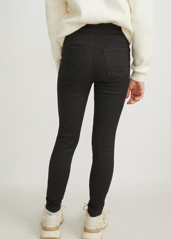 Черные демисезонные скинни джинсы C&A