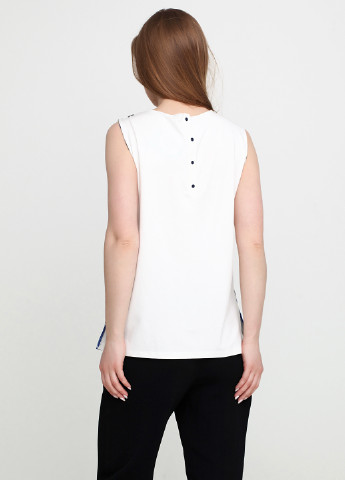 Чёрно-белую блуза Sassofono