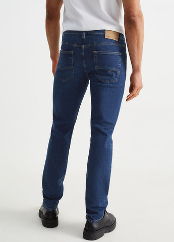 Синие демисезонные зауженные джинсы C&A