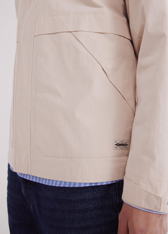 Бежева демісезонна куртка Springfield