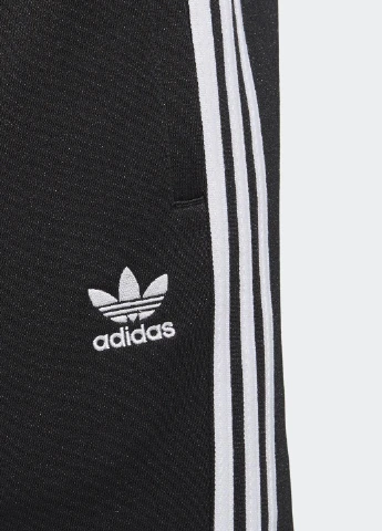 Черные спортивные демисезонные зауженные брюки adidas