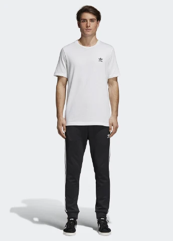 Черные спортивные демисезонные зауженные брюки adidas
