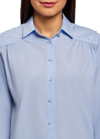 Бледно-синяя демисезонная блуза Oodji