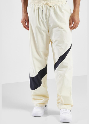 Бежевые спортивные демисезонные прямые брюки Nike