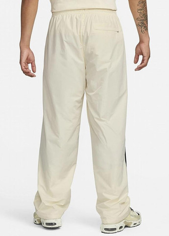 Бежевые спортивные демисезонные прямые брюки Nike