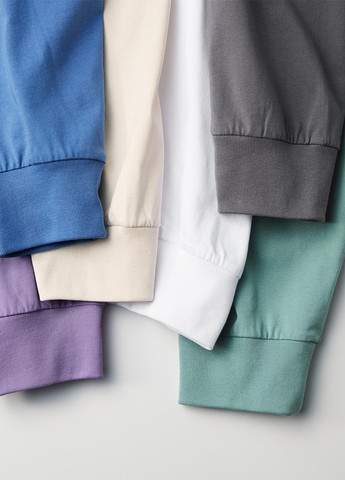 Лонгслів Uniqlo однотонний білий кежуали трикотаж, бавовна