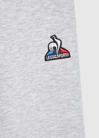 Светло-серые спортивные демисезонные брюки джоггеры Le Coq Sportif