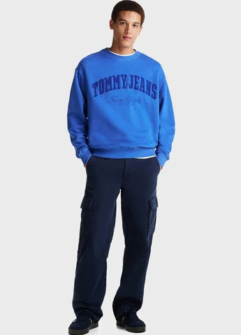 Синій світшот Tommy Jeans однотонний вишивка (347228171)
