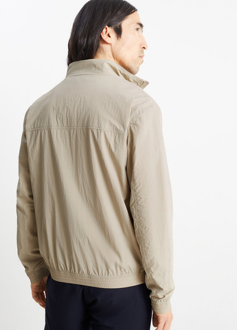 Бежева демісезонна куртка C&A