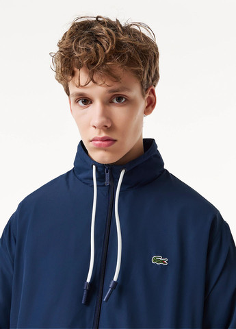 Темно-синя демісезонна вітровка Lacoste