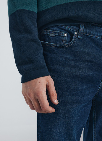 Темно-синие демисезонные зауженные джинсы Springfield