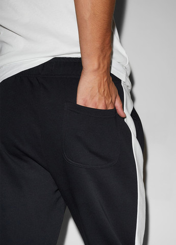 Черные спортивные демисезонные зауженные брюки C&A