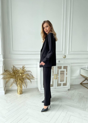 Жіночий костюм піджак та штани палаццо з костюмної тканини чорного кольору р.42 363164 New Trend (256038144)