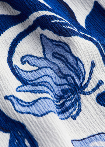 Блакитна кежуал сукня кльош H&M з квітковим принтом