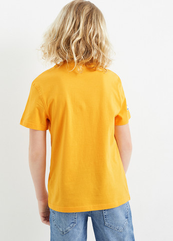 Желтая летняя футболка C&A