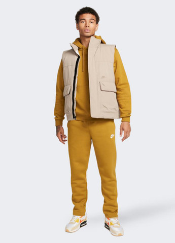 Горчичные спортивные демисезонные зауженные брюки Nike