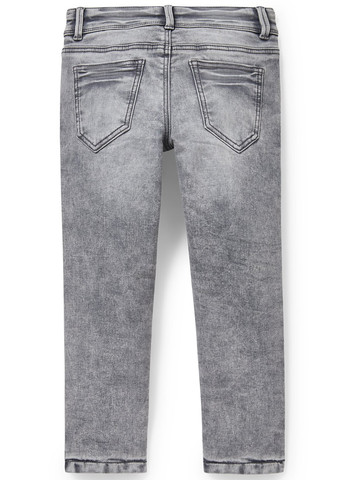 Серые демисезонные зауженные джинсы C&A