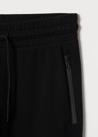 Черные демисезонные брюки H&M
