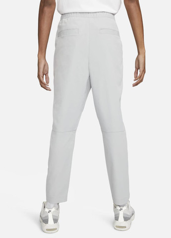 Светло-серые спортивные демисезонные прямые брюки Nike