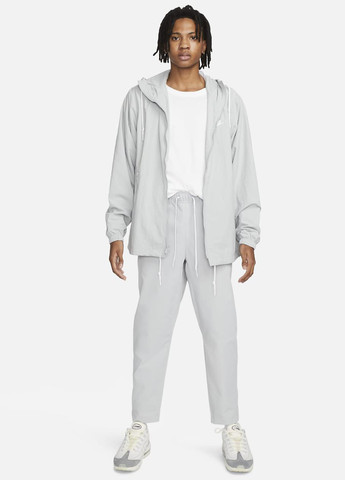 Светло-серые спортивные демисезонные прямые брюки Nike