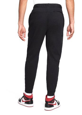 Черные спортивные демисезонные зауженные брюки Jordan