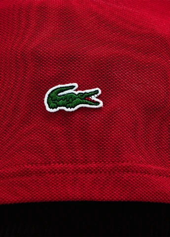 Красная женская футболка-поло Lacoste персонажи