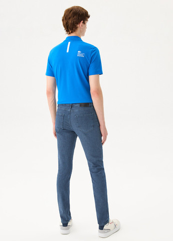 Синие демисезонные скинни джинсы Lacoste