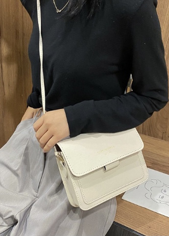 Жіноча класична сумочка крос-боді на ремінці молочна біла NoName (251204089)