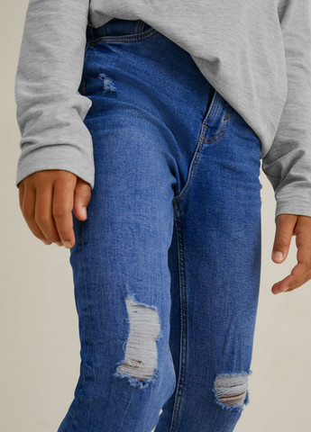 Голубые демисезонные зауженные джинсы C&A