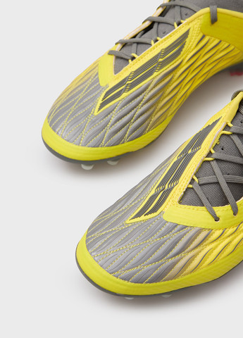 Желтые бутсы Under Armour