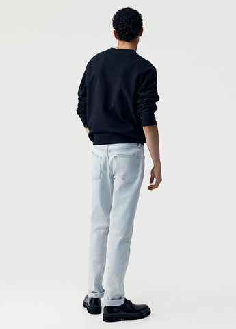 Светло-голубые демисезонные зауженные джинсы H&M