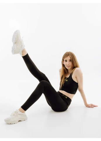 Черные демисезонные женские леггинсы w first ile 7/8 tight черный Puma