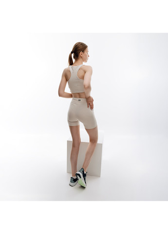 Женский Топ Essentials Reimagined Bra Бежевый New Balance (260956340)