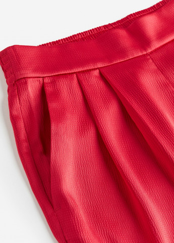 Красные демисезонные брюки H&M