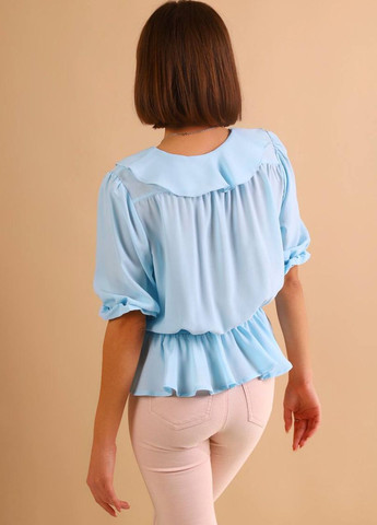 Блакитна демісезонна блузка Anastasimo