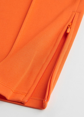 Оранжевые спортивные демисезонные брюки H&M SPORT