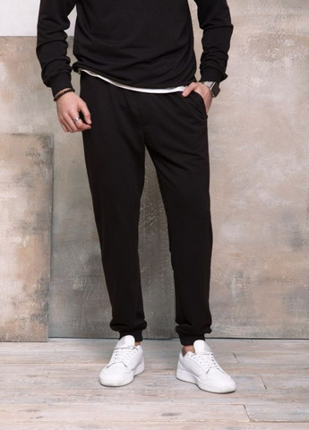 Чорні трикотажні спортивні штани з манжетами ISSA PLUS (266782232)