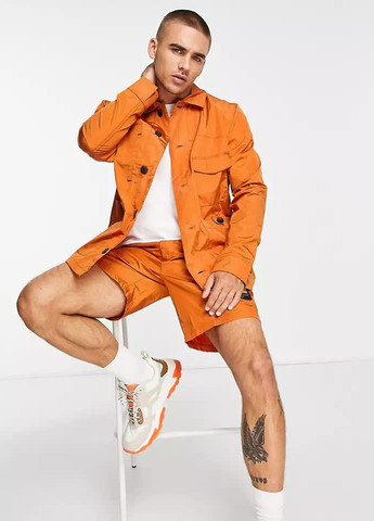 Оранжевая демисезонная куртка-рубашка Fila