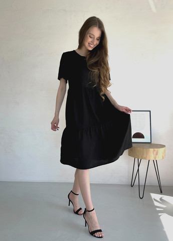 Чорна повсякденний жіноча сукня до коліна однотонна з коротким рукавом з льону чорна 700000161 кльош, дзвін, з спідницею-сонце, оверсайз Merlini однотонна