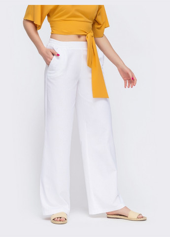 лляні штани-кльош у стилі кежуал з резинкою по талії білі однотонні Dressa (259542891)