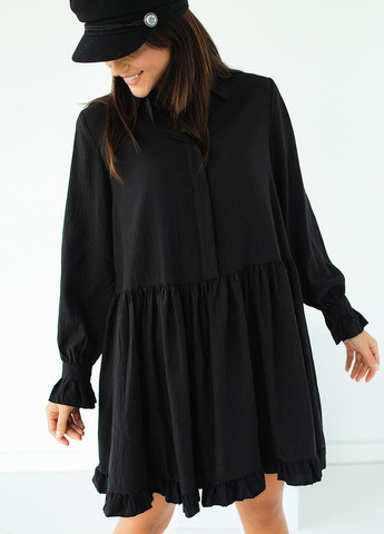 Черное свободное платье с оборкой внизу Hot Fashion